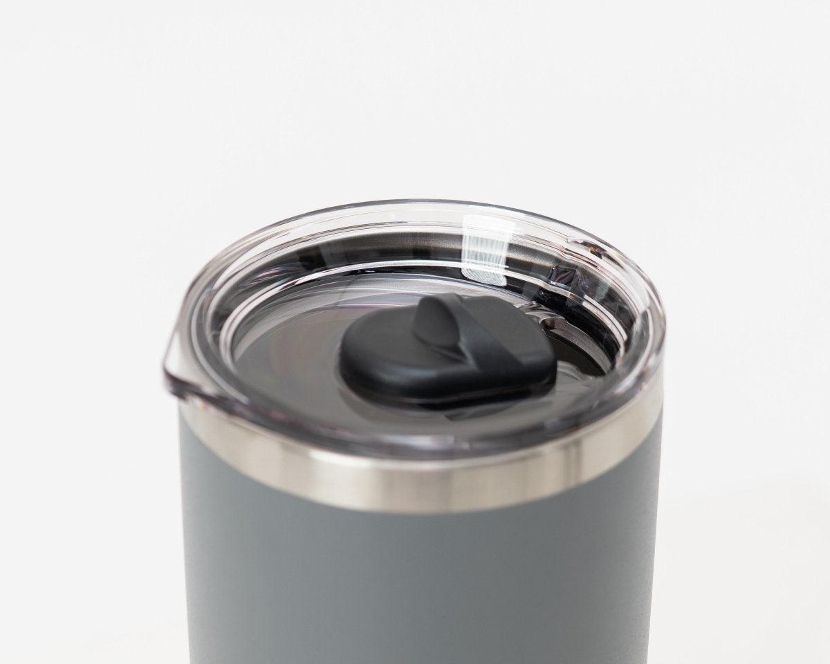 Tumbler with transparent magnetic lid