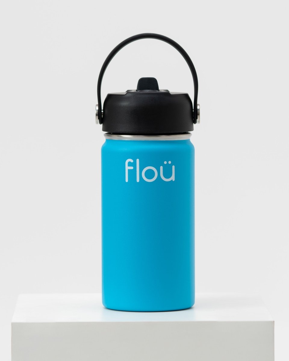 Blue insulated water bottle for kids with handle lid and straw.