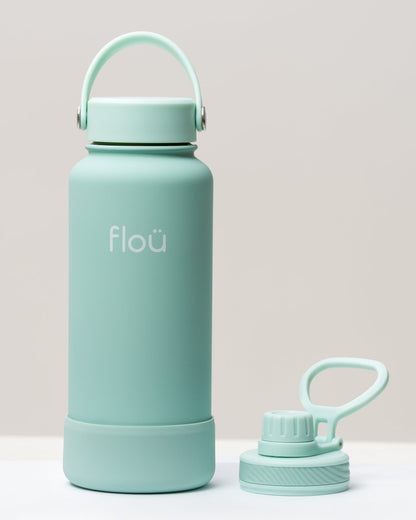 32 oz bluish white double wall insulated water bottle with 2 lids.