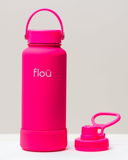 32 oz phosphorescent pink double wall insulated water bottle with 2 lids.