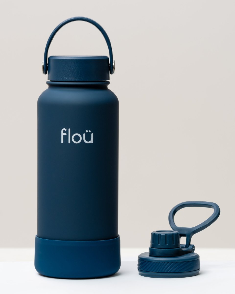 32 oz Indigo blue double wall insulated water bottle with 2 lids.