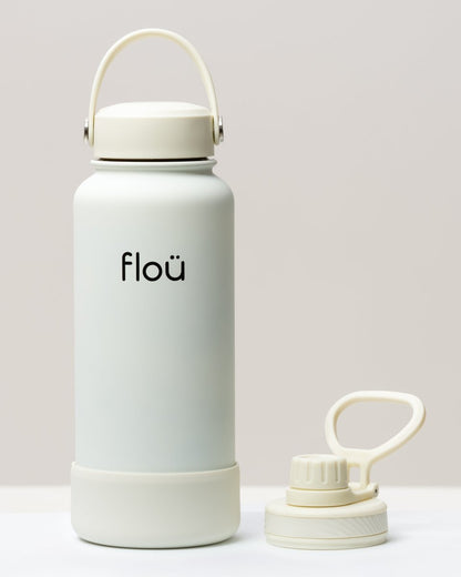 32 oz Ivory double wall insulated water bottle with 2 lids.