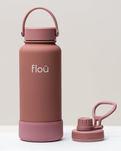 32 oz smoke pink double wall insulated water bottle with 2 lids.